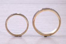 Load image into Gallery viewer, Matching Bridal Bands, 6 mm and 4 mm Wide Spinning Yellow and White Gold Patterned Wedding Bands