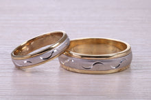 Load image into Gallery viewer, Matching Bridal Bands, 6 mm and 4 mm Wide Spinning Yellow and White Gold Patterned Wedding Bands