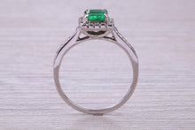 Load image into Gallery viewer, Square cut Natural Emerald Halo and Shoulder set With Diamonds in This 18ct White Gold Ring