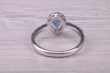 Load image into Gallery viewer, Absolutely Beautiful Blue Sapphire and Halo set Diamond 18ct White Gold Ring