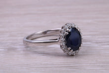Load image into Gallery viewer, Beautiful 1.65 carat Blue Sapphire and Diamond Halo set White Gold Ring