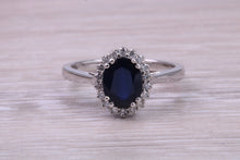 Load image into Gallery viewer, Beautiful 1.65 carat Blue Sapphire and Diamond Halo set White Gold Ring
