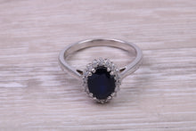 Load image into Gallery viewer, Beautiful 1.65 carat Blue Sapphire and Diamond Halo set White Gold Ring