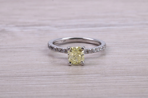 Natural 0.97ct Yellow Emerald cut Diamond with White Diamond set Shoulders Platinum Ring