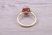 Load image into Gallery viewer, Stunning Cabochon cut 1.40 carat Ruby and Halo set Diamond Ring in Yellow Gold
