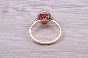 Stunning Cabochon cut 1.40 carat Ruby and Halo set Diamond Ring in Yellow Gold