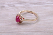 Load image into Gallery viewer, Stunning Cabochon cut 1.40 carat Ruby and Halo set Diamond Ring in Yellow Gold