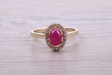 Load image into Gallery viewer, Stunning Cabochon cut 1.40 carat Ruby and Halo set Diamond Ring in Yellow Gold