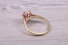 Load image into Gallery viewer, Stunning Cabochon cut 1.40 carat Ruby and Halo set Diamond Ring in Yellow Gold