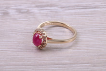 Load image into Gallery viewer, Stunning Cabochon cut 1.40 carat Ruby and Halo set Diamond Ring in Yellow Gold
