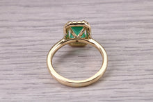 Load image into Gallery viewer, One carat Top Grade Natural Emerald and Natural Diamonds set Ring in 18ct Yellow Gold