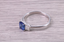 Load image into Gallery viewer, Cushion cut Blue Sapphire and Emerald cut Diamonds set Trilogy Ring, 1.40 carats of Very Top Grade Sapphire and Diamonds, 18ct White Gold