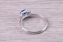 Load image into Gallery viewer, Cushion cut Blue Sapphire and Emerald cut Diamonds set Trilogy Ring, 1.40 carats of Very Top Grade Sapphire and Diamonds, 18ct White Gold