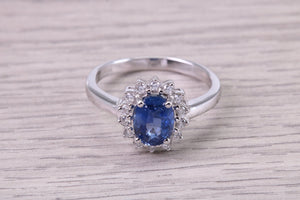 Natural 1.37ct Oval cut Vivid Royal Blue Sapphire and 0.25ct Top Graded Natural Round Diamonds set 18ct White Gold Ring,