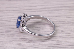 Natural 1.37ct Oval cut Vivid Royal Blue Sapphire and 0.25ct Top Graded Natural Round Diamonds set 18ct White Gold Ring,