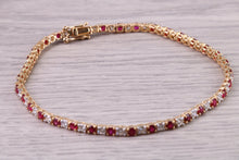 Load image into Gallery viewer, Four carats Natural Rubies and Diamonds set Solid Yellow Gold Tennis Bracelet, British Hallmarked