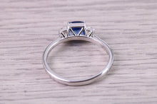 Load image into Gallery viewer, Cushion cut Blue Sapphire and Emerald cut Diamonds set Trilogy Ring, 1.40 carats of Very Top Grade Sapphire and Diamonds, 18ct White Gold