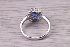 Natural 1.37ct Oval cut Vivid Royal Blue Sapphire and 0.25ct Top Graded Natural Round Diamonds set 18ct White Gold Ring,