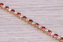 Load image into Gallery viewer, Four carats Natural Rubies and Diamonds set Solid Yellow Gold Tennis Bracelet, British Hallmarked