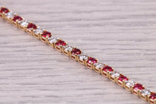 Load image into Gallery viewer, Four carats Natural Rubies and Diamonds set Solid Yellow Gold Tennis Bracelet, British Hallmarked