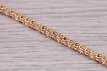 Load image into Gallery viewer, Four carats Natural Rubies and Diamonds set Solid Yellow Gold Tennis Bracelet, British Hallmarked