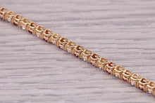 Load image into Gallery viewer, Four carats Natural Rubies and Diamonds set Solid Yellow Gold Tennis Bracelet, British Hallmarked