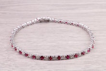 Load image into Gallery viewer, Four carats Natural Rubies and Diamonds set Solid White Gold Tennis Bracelet, British Hallmarked
