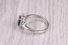 Load image into Gallery viewer, Natural 1.45ct Oval cut Royal Blue Sapphire and 0.25ct Top Graded Natural Round Diamonds set 18ct White Gold Ring, British Hallmarked