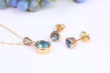 Load image into Gallery viewer, Round cut Blue Topaz Matching Earrings and Necklace set in Yellow Gold
