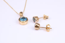 Load image into Gallery viewer, Round cut Blue Topaz Matching Earrings and Necklace set in Yellow Gold