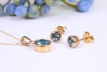Load image into Gallery viewer, Round cut Blue Topaz Matching Earrings and Necklace set in Yellow Gold