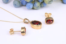 Load image into Gallery viewer, Oval cut Garnet Earrings and Matching Necklace set in Yellow Gold