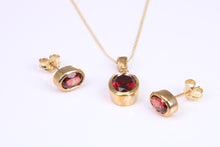 Load image into Gallery viewer, Oval cut Garnet Earrings and Matching Necklace set in Yellow Gold