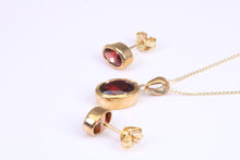 Load image into Gallery viewer, Oval cut Garnet Earrings and Matching Necklace set in Yellow Gold