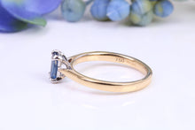 Load image into Gallery viewer, Dainty 0.62 carat Rectangle Emerald cut Blue Sapphire Solitaire, made from 8ct Yellow Gold and complimented with a Platinum setting