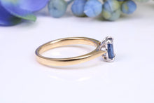 Load image into Gallery viewer, Dainty 0.62 carat Rectangle Emerald cut Blue Sapphire Solitaire, made from 8ct Yellow Gold and complimented with a Platinum setting