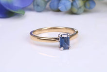 Load image into Gallery viewer, Dainty 0.62 carat Rectangle Emerald cut Blue Sapphire Solitaire, made from 8ct Yellow Gold and complimented with a Platinum setting