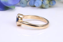Load image into Gallery viewer, Beautiful 0.90 carat Oval cut Blue Sapphire Twist Shank Solitaire, British Hallmarked Yellow Gold