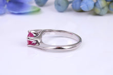 Load image into Gallery viewer, 0.62ct round cut Natural Ruby set in this Twist Shank Platinum Solitaire