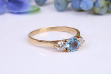 Load image into Gallery viewer, Aquamarine and Diamond set Yellow Gold Trilogy Ring