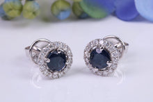 Load image into Gallery viewer, Beautiful One carat each Blue Sapphire and Diamond Halo set Earrings, 18ct White Gold, British Hallmarked