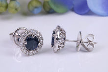 Load image into Gallery viewer, Beautiful One carat each Blue Sapphire and Diamond Halo set Earrings, 18ct White Gold, British Hallmarked