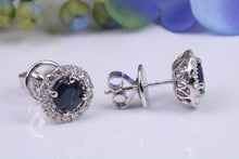 Load image into Gallery viewer, Beautiful One carat each Blue Sapphire and Diamond Halo set Earrings, 18ct White Gold, British Hallmarked