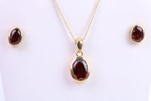 Load image into Gallery viewer, Oval cut Garnet Earrings and Matching Necklace set in Yellow Gold