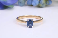 Load image into Gallery viewer, Dainty 0.62 carat Rectangle Emerald cut Blue Sapphire Solitaire, made from 8ct Yellow Gold and complimented with a Platinum setting