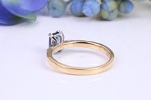 Load image into Gallery viewer, Dainty 0.62 carat Rectangle Emerald cut Blue Sapphire Solitaire, made from 8ct Yellow Gold and complimented with a Platinum setting