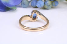 Load image into Gallery viewer, Beautiful 0.90 carat Oval cut Blue Sapphire Twist Shank Solitaire, British Hallmarked Yellow Gold