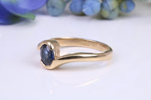 Load image into Gallery viewer, Beautiful 0.90 carat Oval cut Blue Sapphire Twist Shank Solitaire, British Hallmarked Yellow Gold
