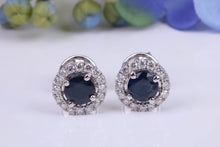 Load image into Gallery viewer, Beautiful One carat each Blue Sapphire and Diamond Halo set Earrings, 18ct White Gold, British Hallmarked