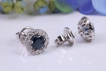 Load image into Gallery viewer, Beautiful One carat each Blue Sapphire and Diamond Halo set Earrings, 18ct White Gold, British Hallmarked
